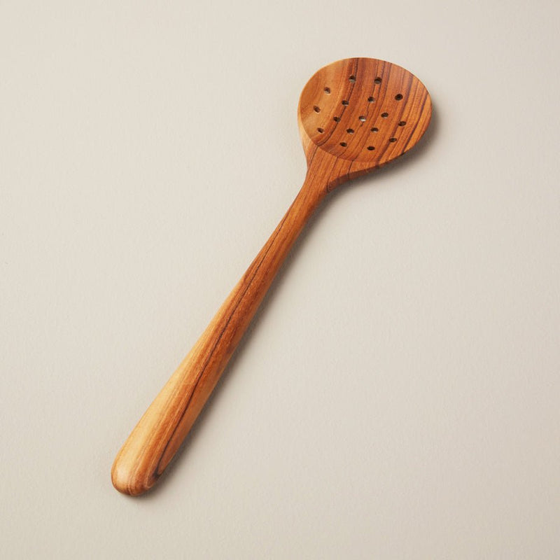 A beautiful wooden strainer spoon from Be HOME.