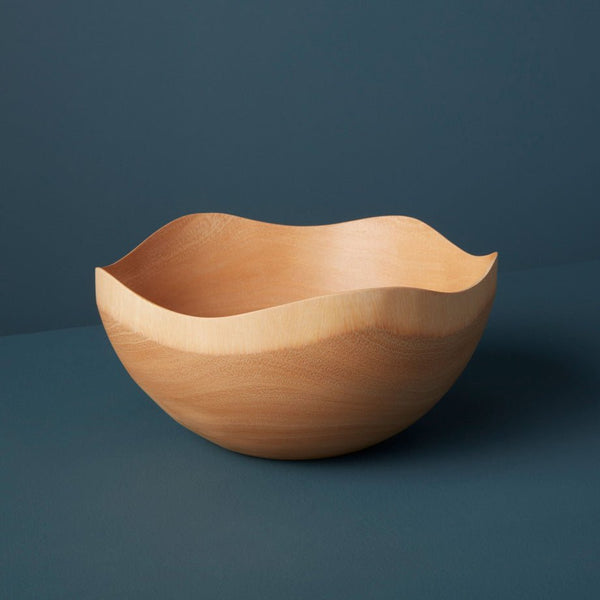 Mango wood wave edge bowl from Be Home. A beautiful addition to any kitchen.