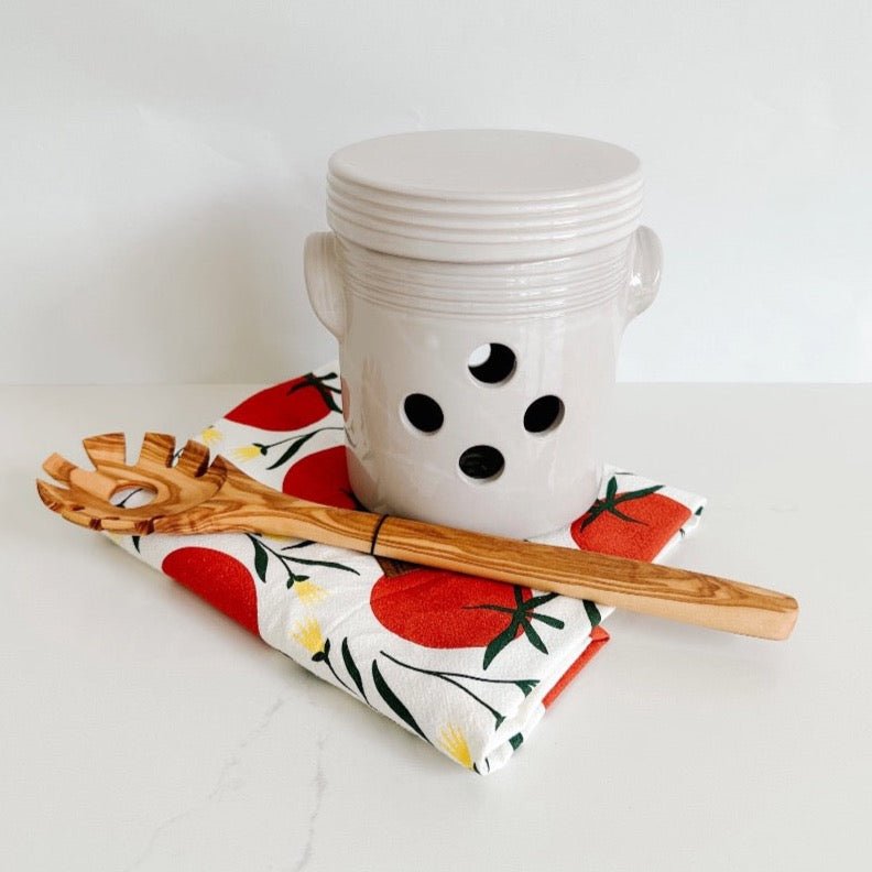 French Dry Goods garlic pot paired with a wooden pasta spoon and Hazelmade tomato tea towel.