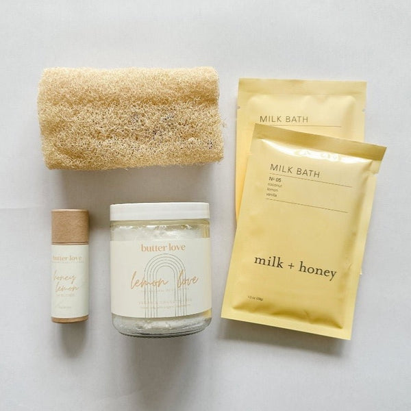 Milk and Honey milk bath, butter love body butter and lip balm and a luffa make a delightful combo in pale yellows.