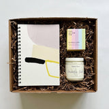 Wish them a happy birthday with this birthday cake tea, lavender body butter and moglea notebook.