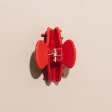 Add this Nat and Noor hair claw in red to a fun beauty birthday gift!