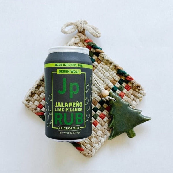 Spiceology jalapeno lime pilsner rub paired with Kate Kilmurray potholder and pretty tree ornament.