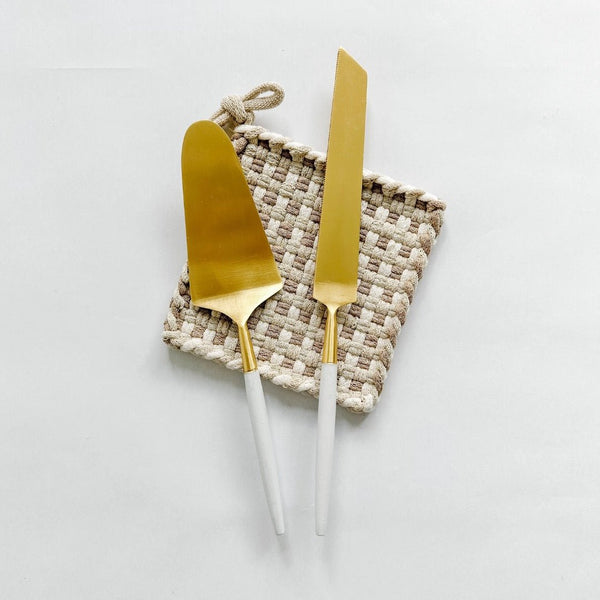 Be Home cake servers paired and a Kate Kilmurray handwoven potholder. A perfectly simple engagement gift.