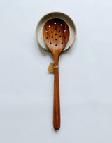 M.bueno handmade spoon rest and teak strainer spoon make a beautiful gift.