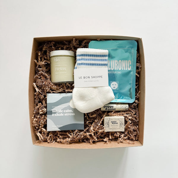 The self-care bundle includes socks, relax body scrub, hyaluronic face masks, shower steamers and lip products.